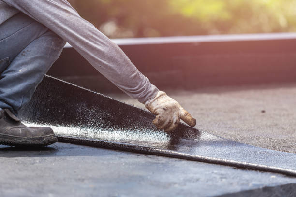 Professional Basement Waterproofing technician working in Van Buren, IN